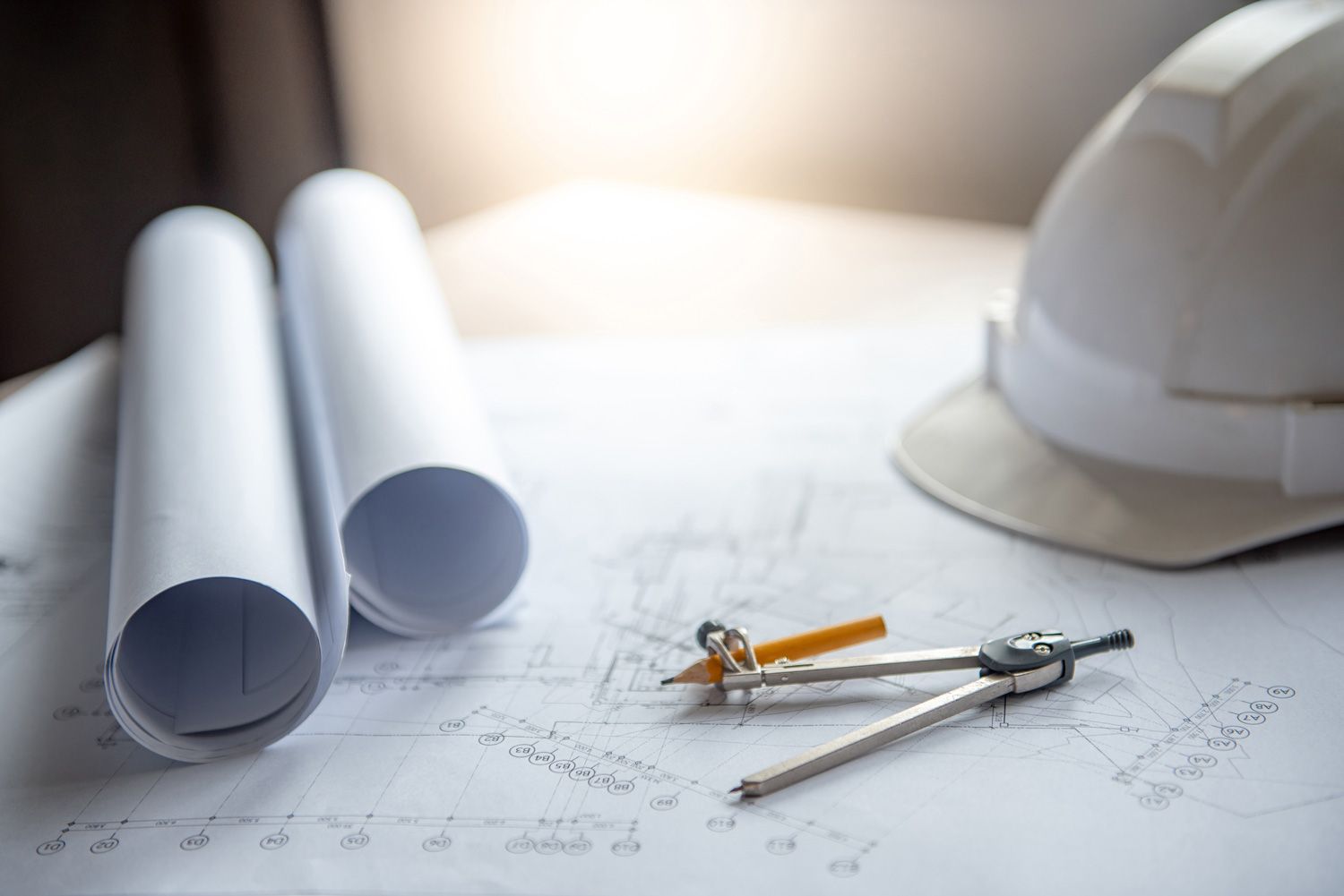 A woman construction worker monitors the current building site